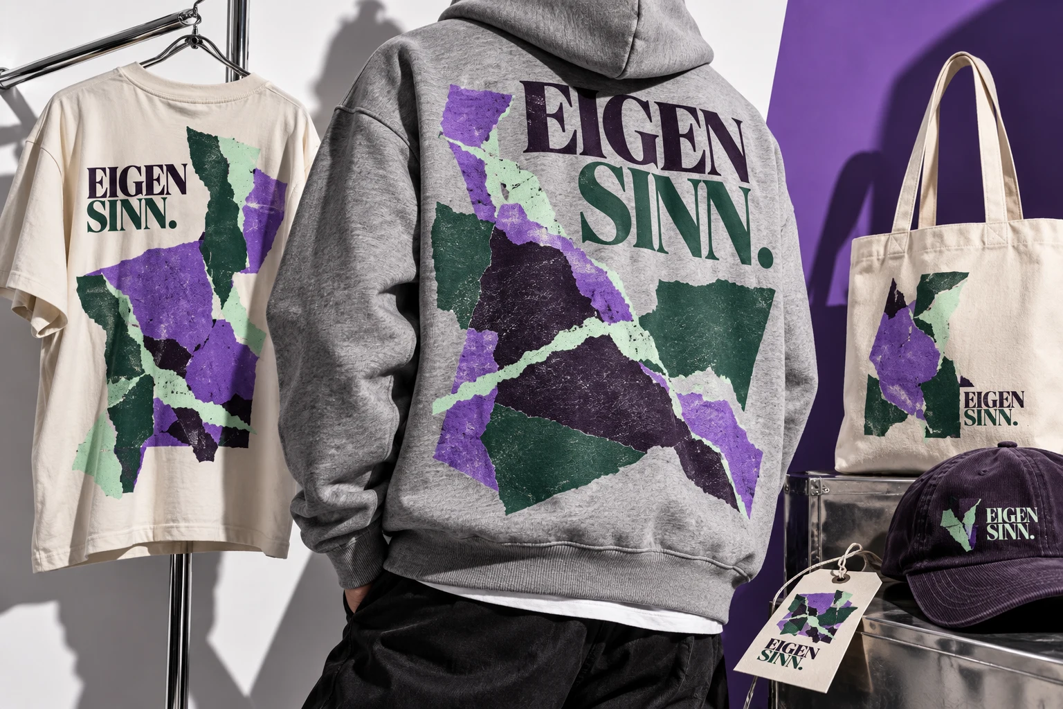 Fiktives Motiv EIGEN SINN auf Hoodie, Shirt, Cap und Stofftasche
